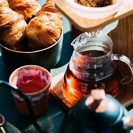 فندق Three House